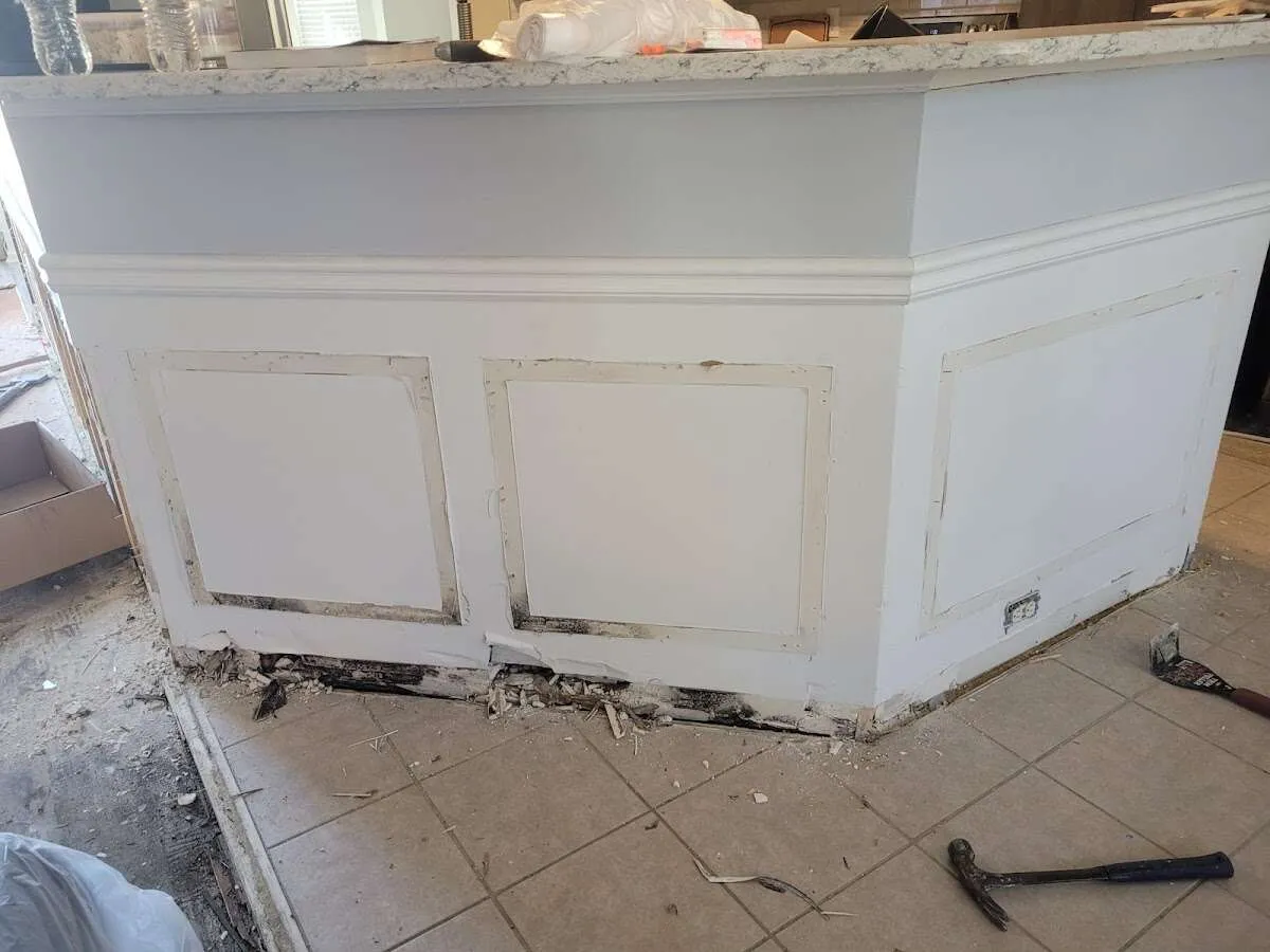 Water damage and mold on kitchen during Storm Damage Restoration in Ames